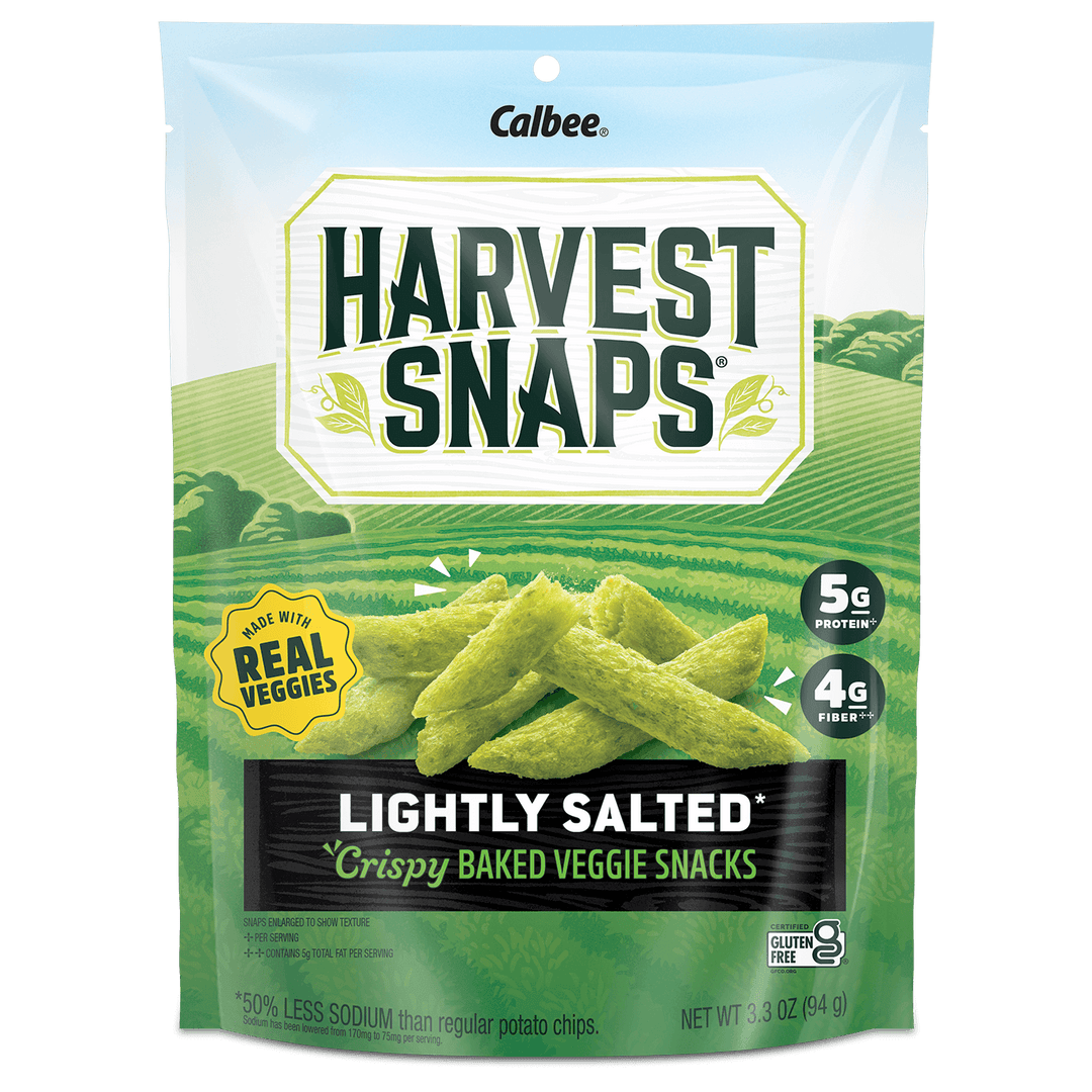Packaging of Harvest Snaps Lightly Salted Crispy Baked Veggie Snacks. Features farm imagery, labels for 5g protein, 4g fiber, and gluten-free.