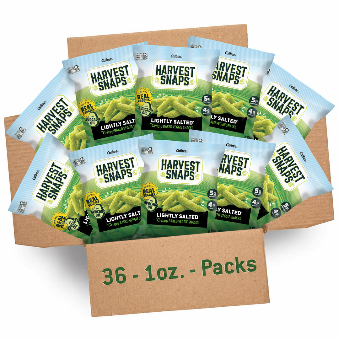 Open box containing 36 individual 1 oz. bags of Harvest Snaps Lightly Salted Crispy Baked Veggie Snacks made with real veggies and avocado oil.
