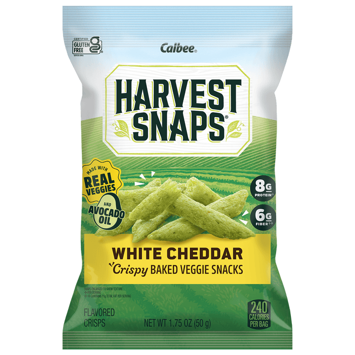 A bag of Calbee Harvest Snaps White Cheddar Crispy Baked Veggie Snacks, featuring green cheese-flavored sticks on the front of the packaging.