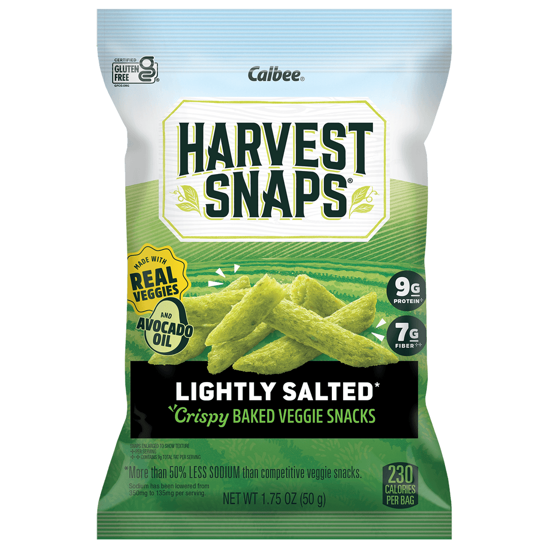 A bag of Calbee Harvest Snaps Lightly Salted Crispy Baked Veggie Snacks, featuring green pickle-like sticks on a green and white package.